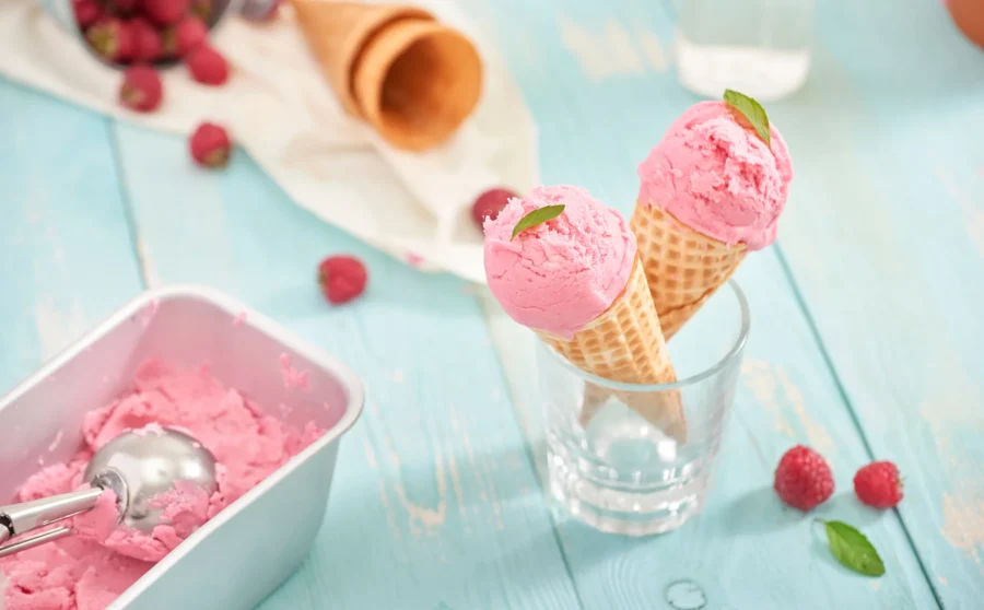 49160340 homemade raspberry ice cream in waffle cones